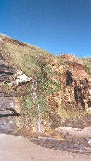 An ickle waterfall on Bundoran beach, Co. Donegal